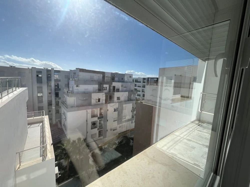 🏡✨ À LOUER – S+2 Neuf avec Parking, Balcon & Suite Parentale ✨🏡
